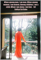 sri-sathya-sai-baba-standing-on-balcony-looking-into-the-woods